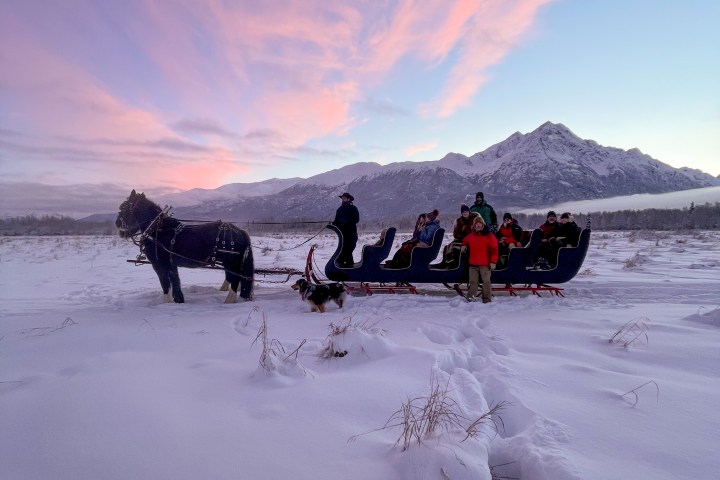 a group of people that are standing in the snow